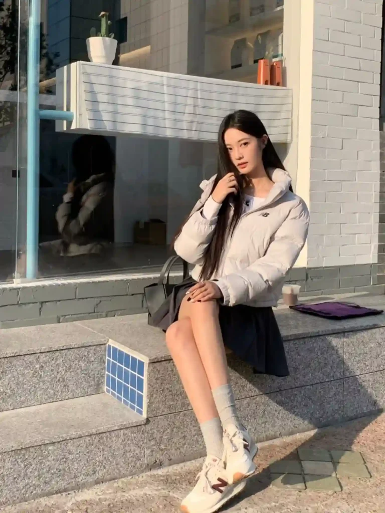 Puffer Jacket with Mini Skirt and New Balance 204L