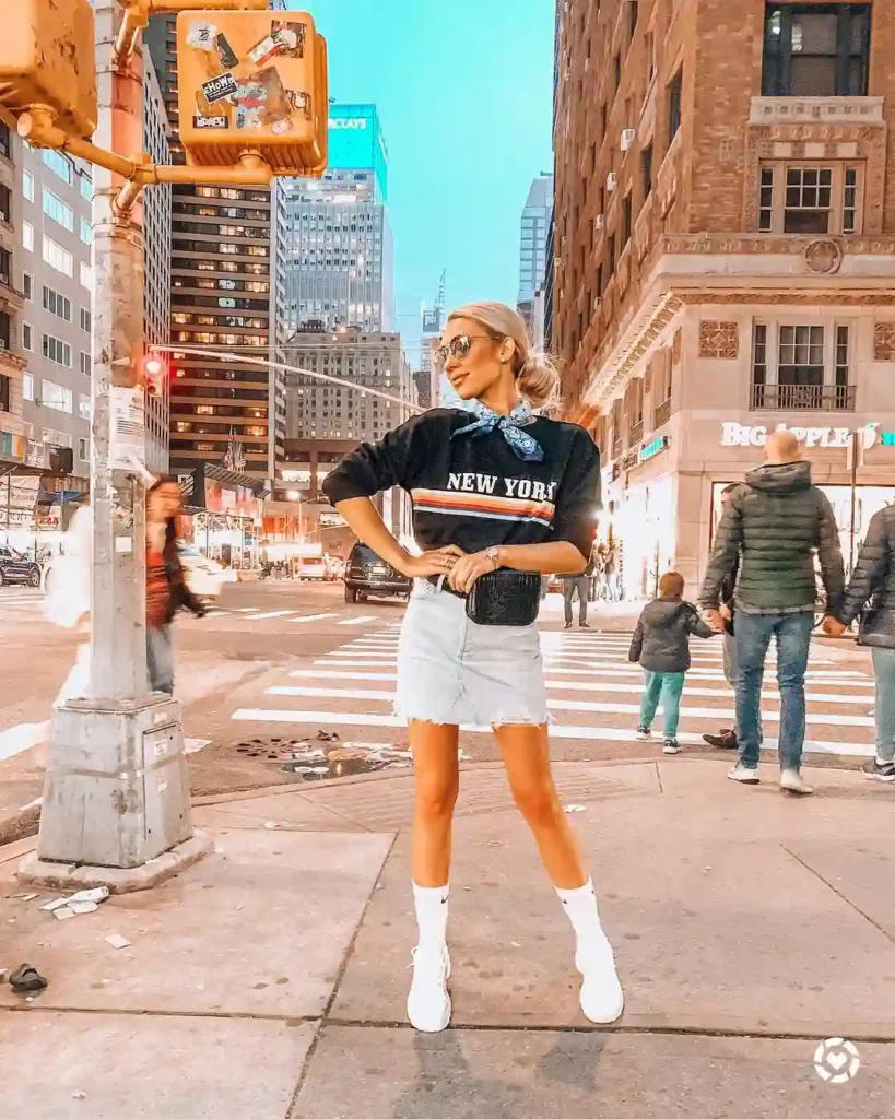 Black Sweatshirt with Denim Mini Skirt and White Chunky Sneakers
