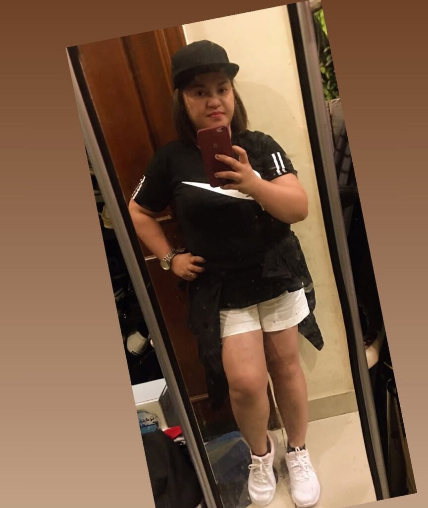 Black Graphic Tee with White Shorts and White Sneakers