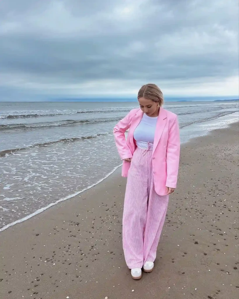 Pink Blazer with Striped Wide-Leg Pants and Sneakers Outfit