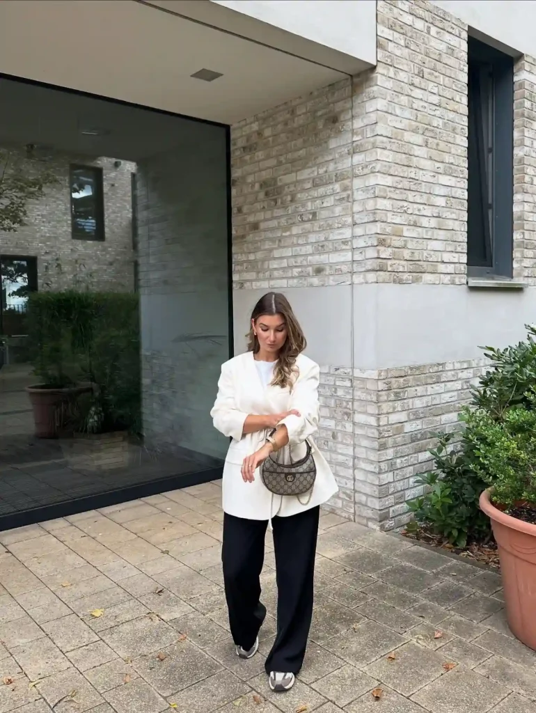 White Blazer with Wide-Leg Pants and Sneakers Outfit
