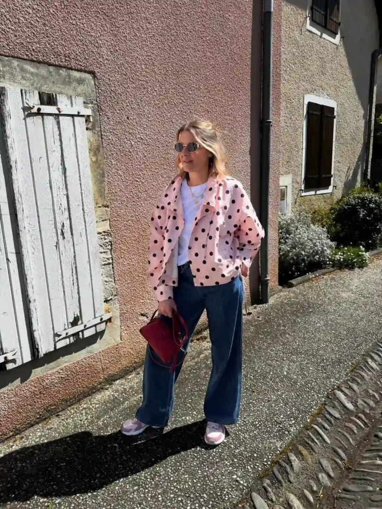 Pink Polka Dot Jacket with Wide-Leg Jeans and Pink New Balance Shoes
