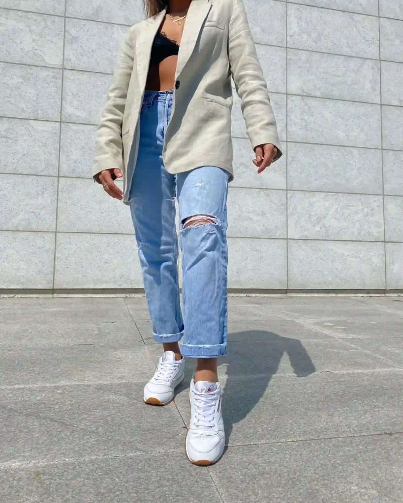 Beige Blazer with Ripped Jeans and Reebok White Sneakers