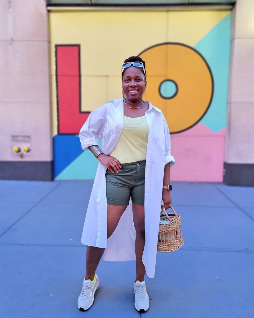 White Long Shirt with Olive Shorts and White Sneakers