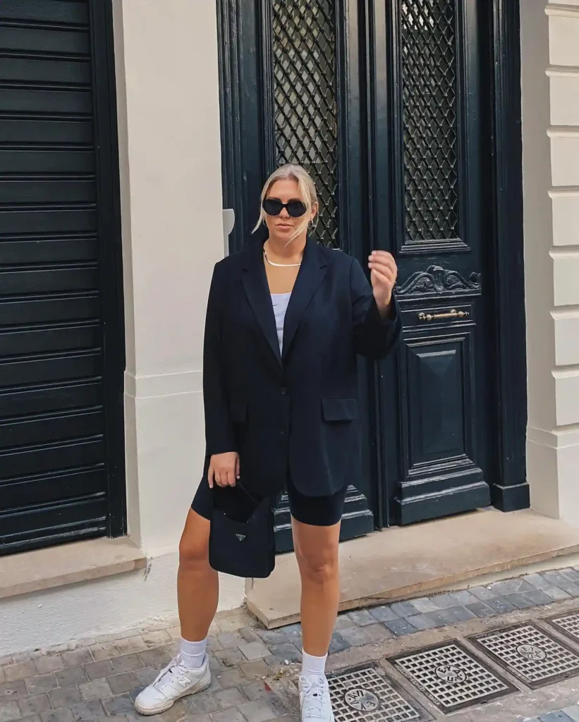 Oversized Black Blazer with Biker Shorts and Sneakers