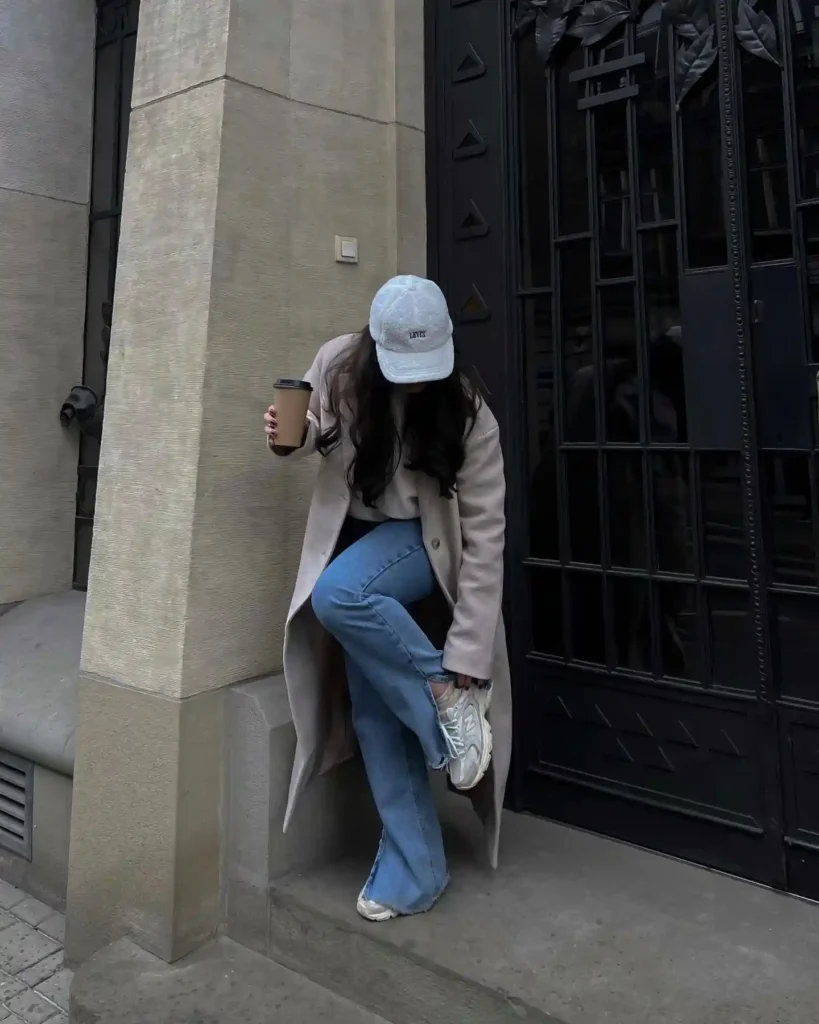 Beige Coat with Light Flared Jeans and New Balance 530 Outfit