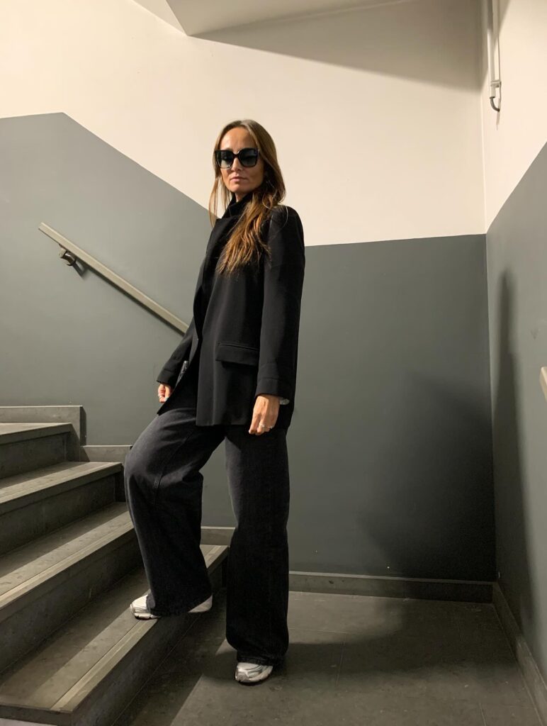 Black Blazer with Wide-Leg Pants and Sneakers Outfit