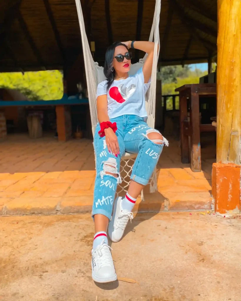 Graphic Heart Tee with Ripped Jeans and White Sneakers