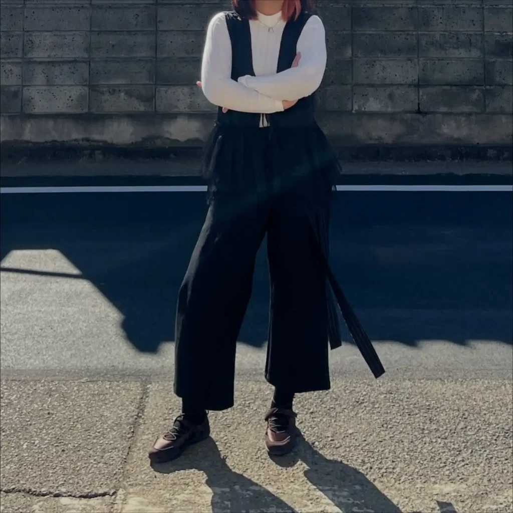 Layered Black Jumpsuit with Ballet Sneakers Outfit