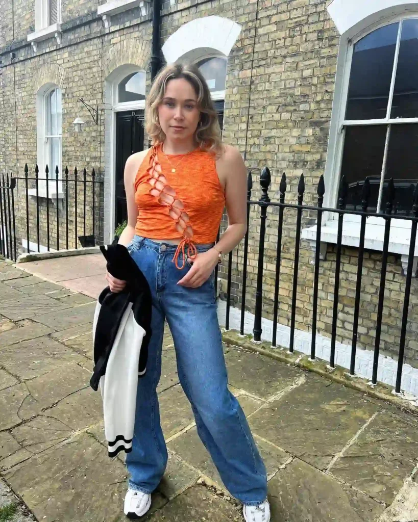 Orange Cut-Out Top with Wide-Leg Jeans and New Balance 530 Outfit