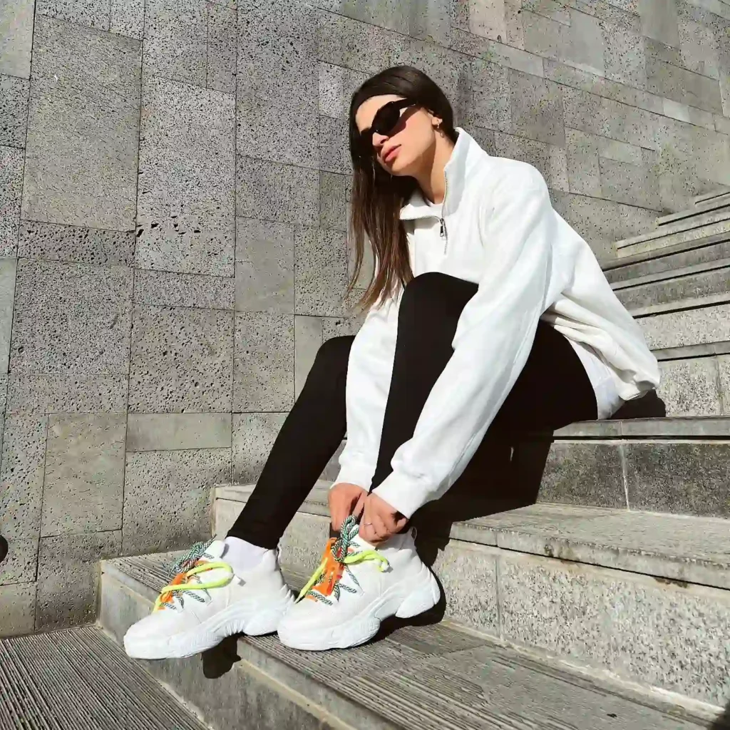 Oversized White Sweatshirt with Black Leggings and White Chunky Sneakers