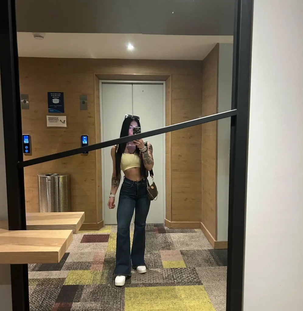 Yellow Crop Top with Dark Flared Jeans and Air Force 1 Outfit
