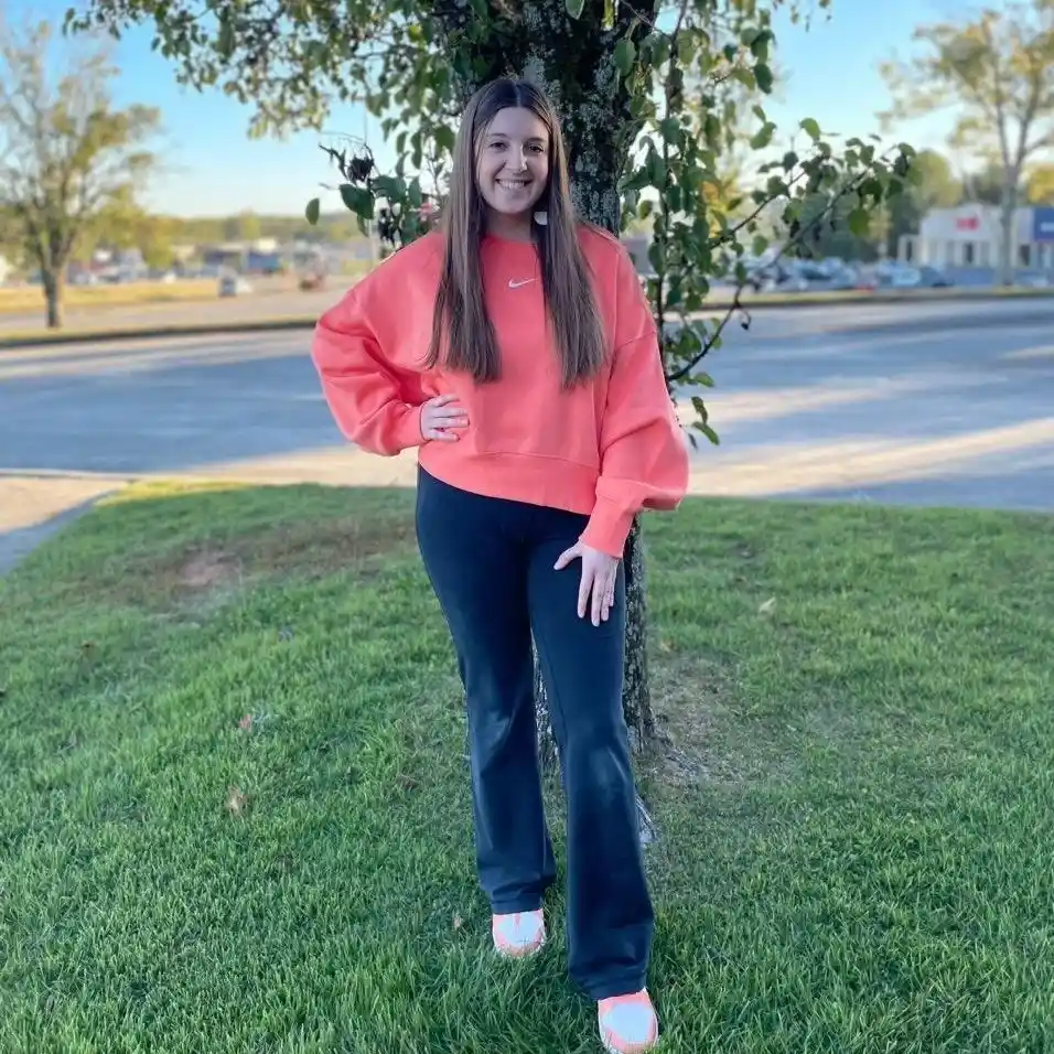 Coral Sweatshirt with Black Flared Pants