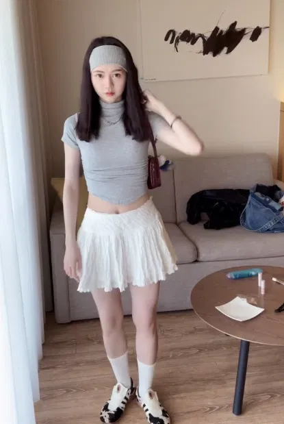 Grey Crop Top with White Pleated Skirt and Black Adidas Taekwondo