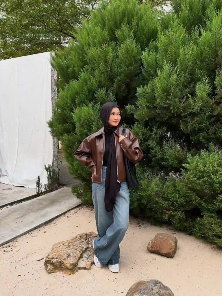 Brown Leather Jacket with Baggy Jeans and White Sneakers