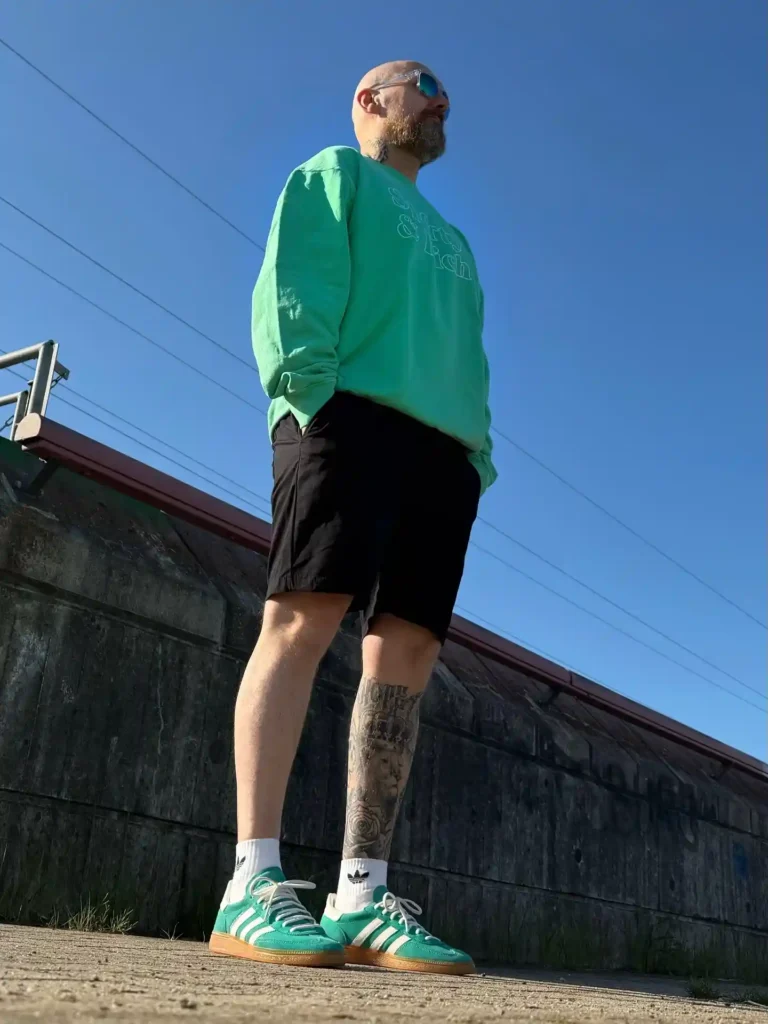 Green Sweatshirt with Black Shorts and Green Adidas Spezial