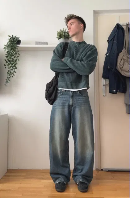 Green Knit Sweater with Wide-Leg Jeans and Dark Adidas Spezial