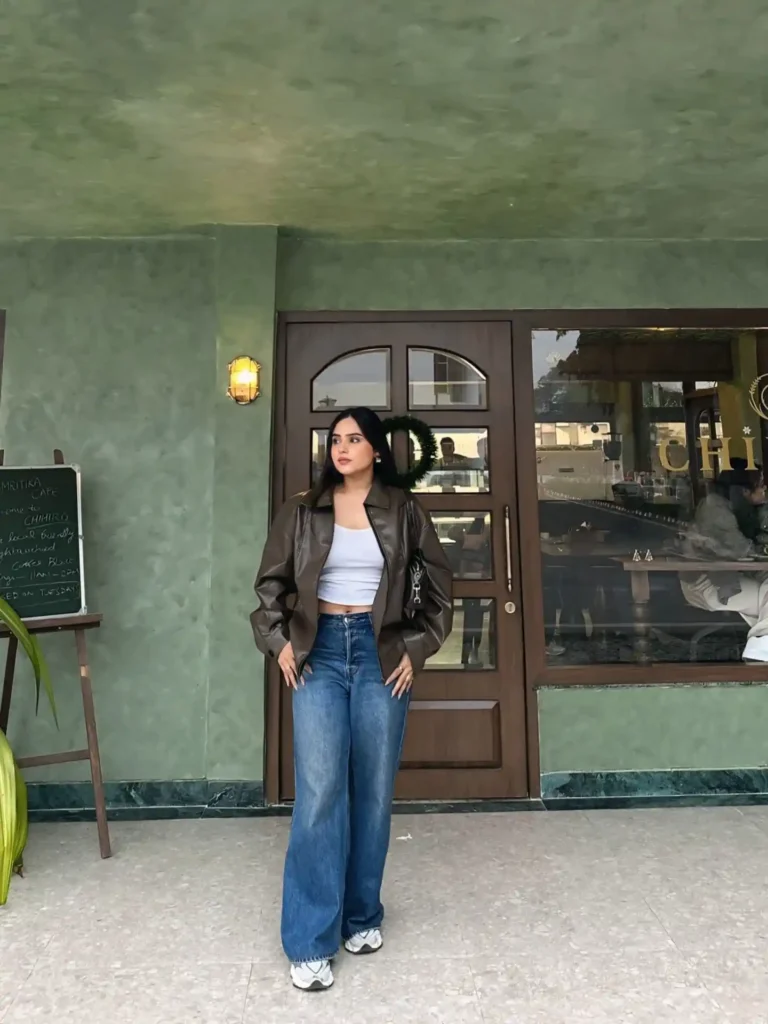 Olive Leather Jacket with a Crop Top and Wide-Leg Jeans
