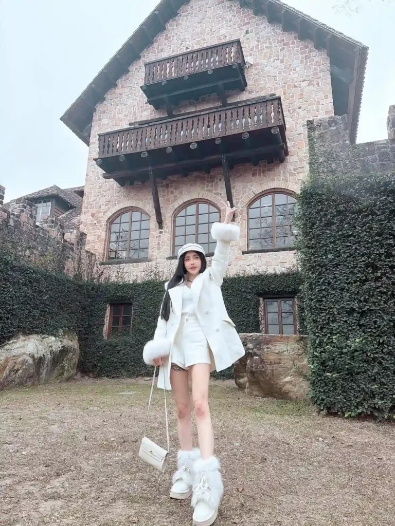 White Blazer with Fur-Cuff Furry Boots Winter Outfit