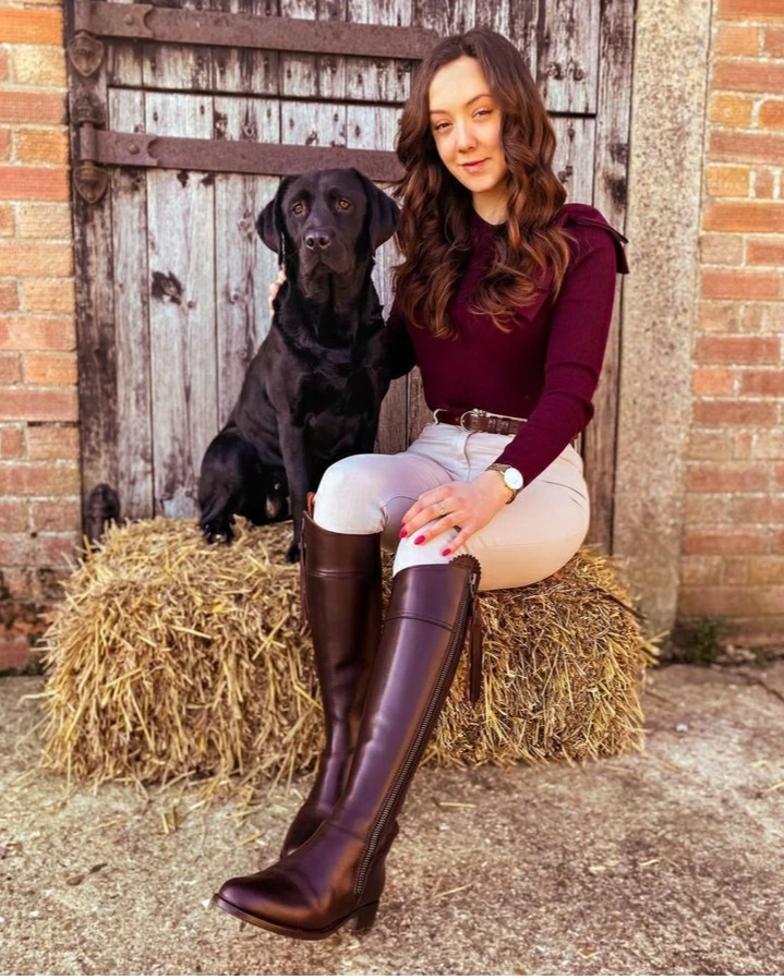 Burgundy Top with Brown Knee High Riding Boots and Jeans Outfit
