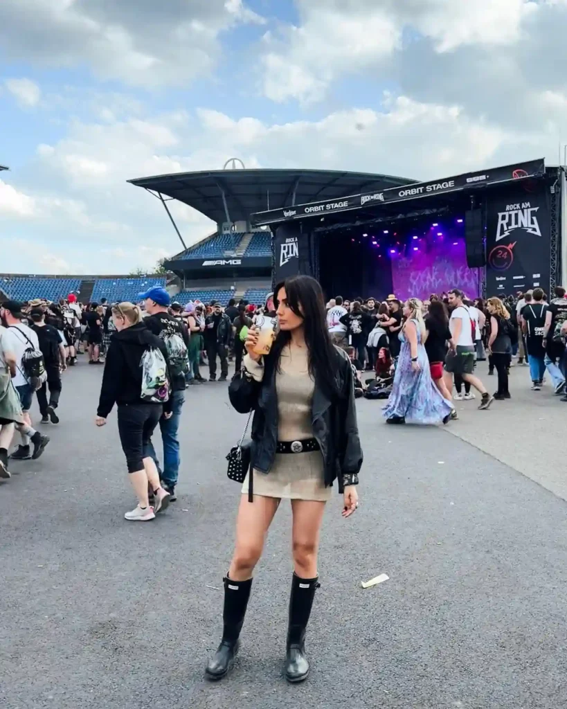 Knit Mini Dress with Leather Jacket and Knee-High Boots Festival Look