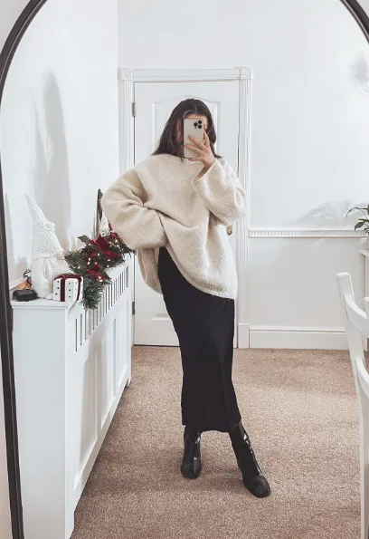 Black Satin Skirt with Oversized Cream Sweater Outfit