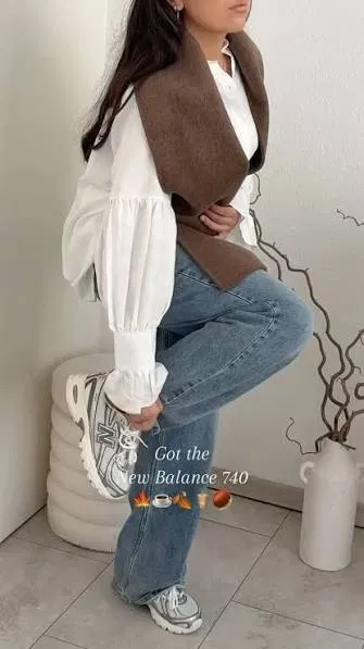 White Puff-Sleeve Blouse with Straight Jeans and New Balance 740