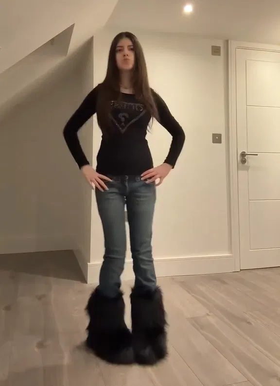 Black Long-Sleeve with Bootcut Jeans and Black Fur Boots