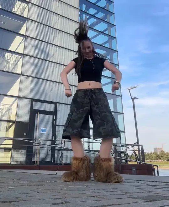 Crop Top with Camo Cargo Shorts and Fur Boots