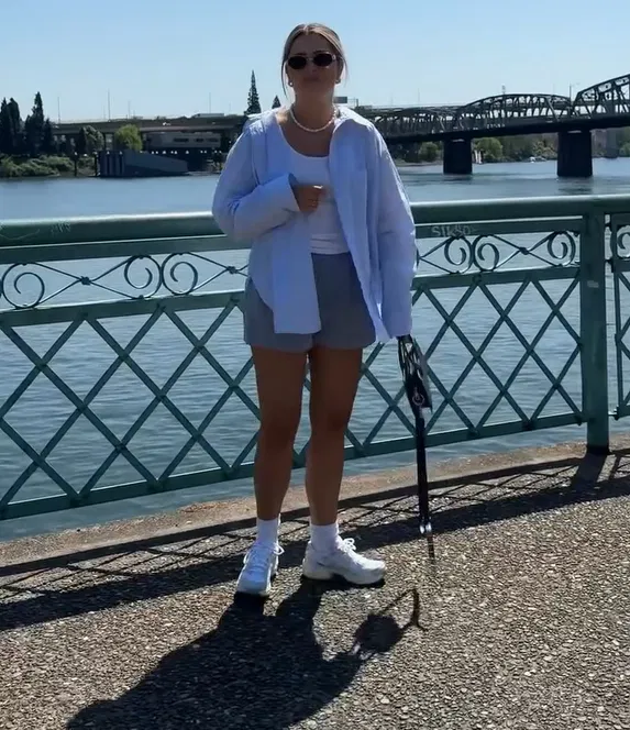 Blue Shirt with Gray Shorts and White Sneakers