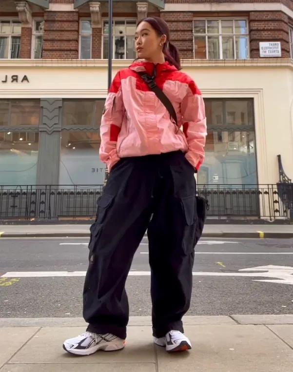 Pink and Red Jacket with Black Cargo Pants and Chunky Sneakers