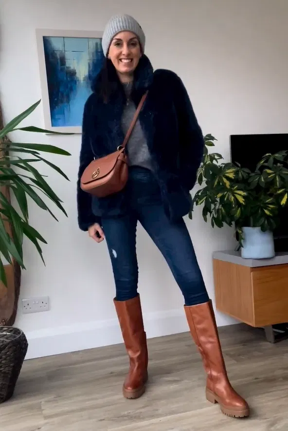 Navy Fur Jacket with Cognac Knee High Boots and Skinny Jeans Outfit