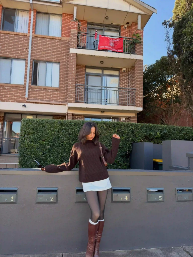 Brown Sweater with White Skirt and Boots