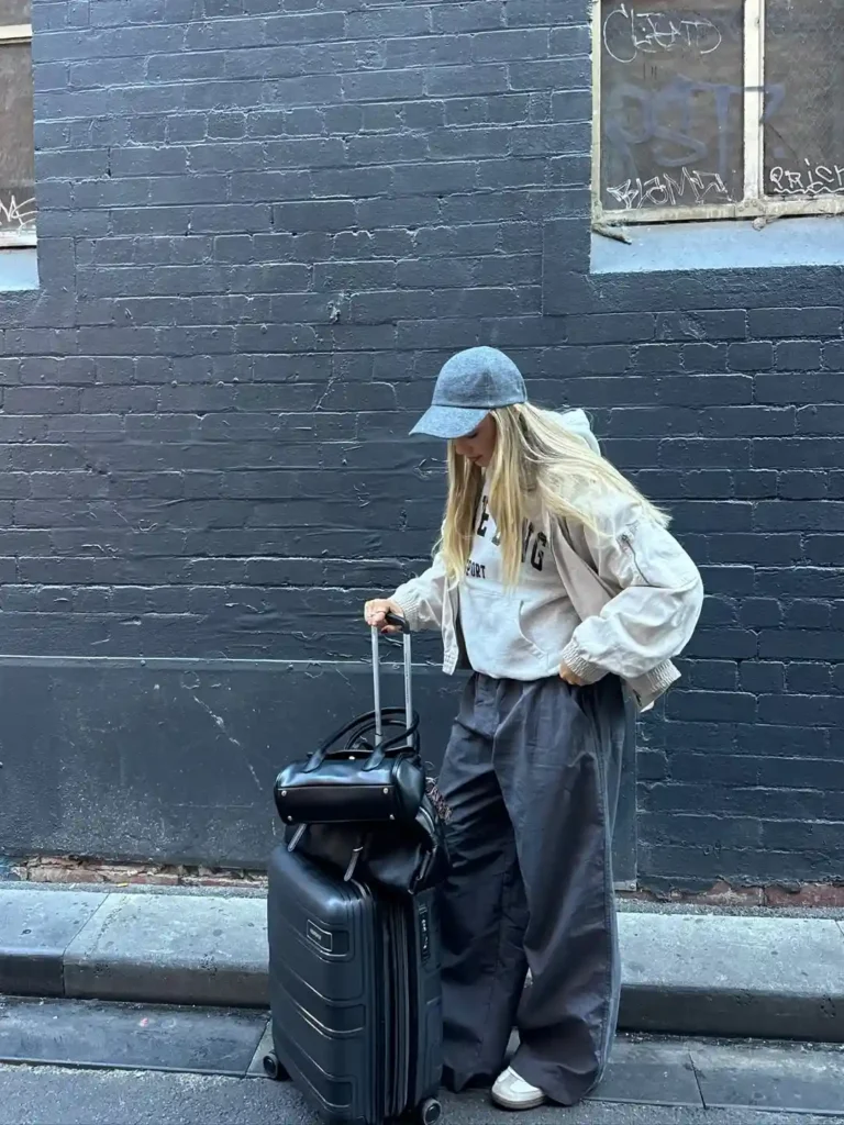 Grey Hoodie with Bomber Jacket and Wide-Leg Trousers Airport Outfit