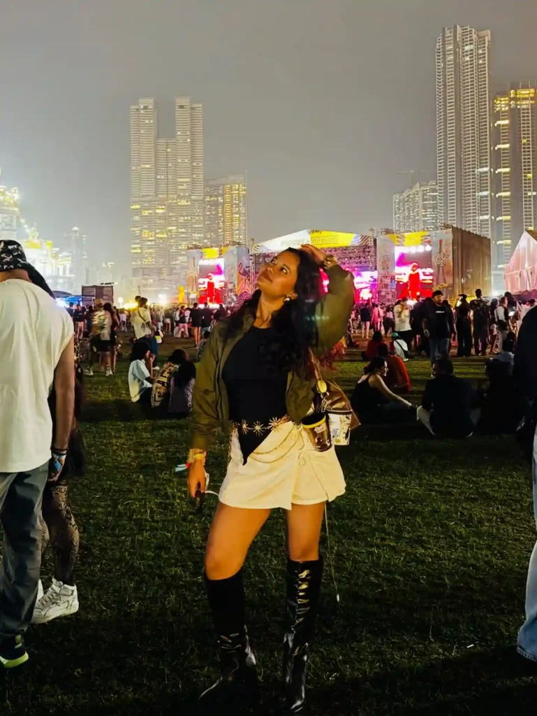 Bomber Jacket with White Skort and Lace-Up Boots Festival Outfit