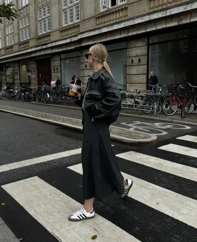 Leather Bomber over Black Maxi Dress