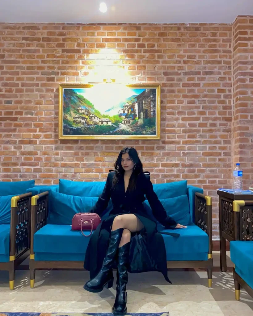 All-Black Coat Dress with Black Knee High Boots Halloween Outfit