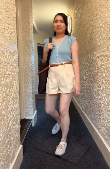 Blue Knit Vest with Tailored White Shorts