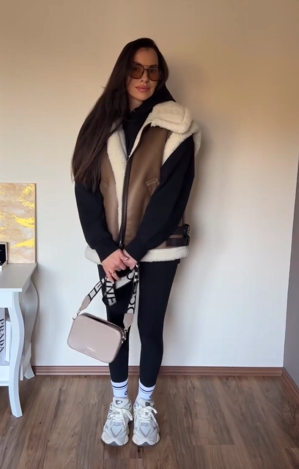 Shearling Vest and Black Hoodie with New Balance 9060