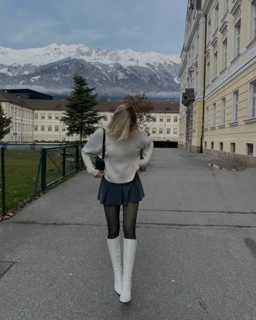 White Sweater with Pleated Mini Skirt and White Knee High Boots