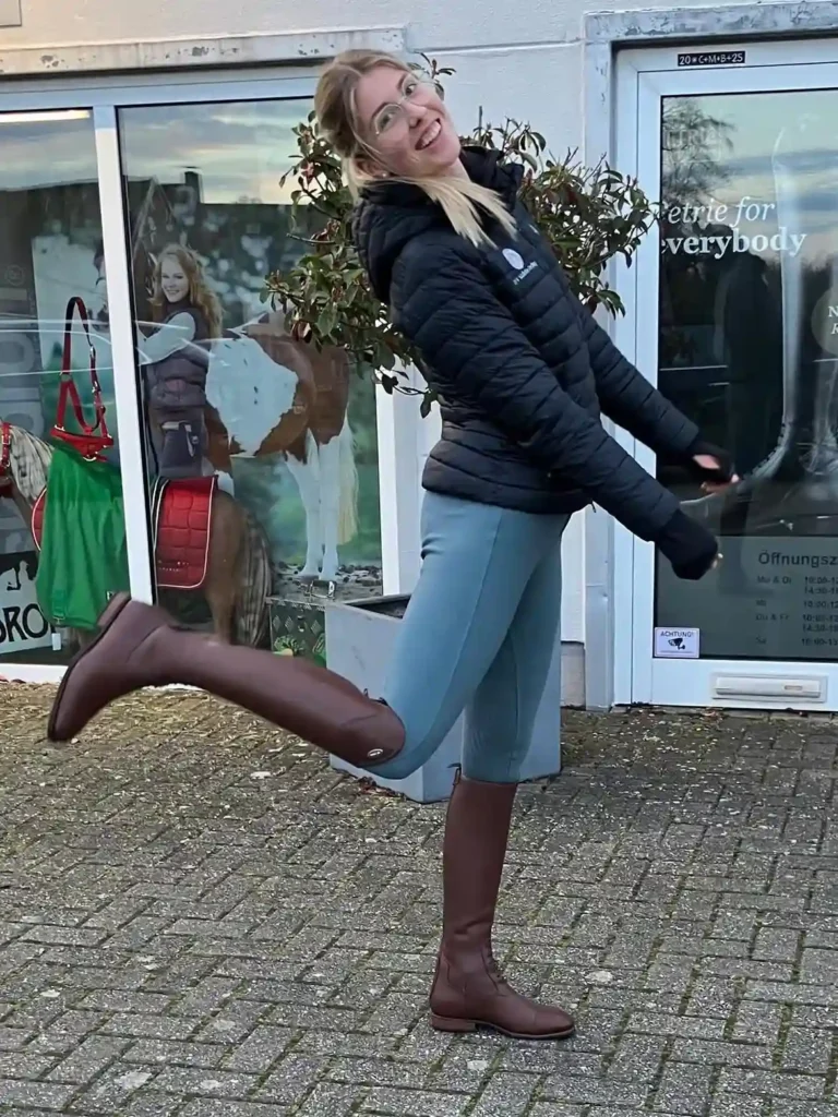 Quilted Jacket and Blue Breeches with Tall Riding Boots