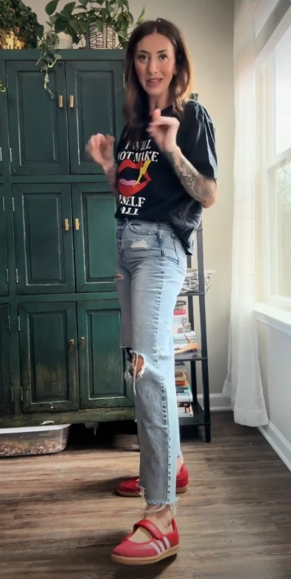 Graphic Tee with Ripped Straight Jeans and Red Adidas Sambas