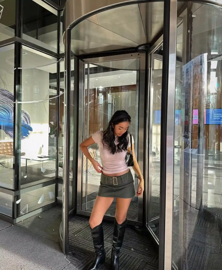 Baby Tee with Belted Cargo Skirt and Black Knee High Boots