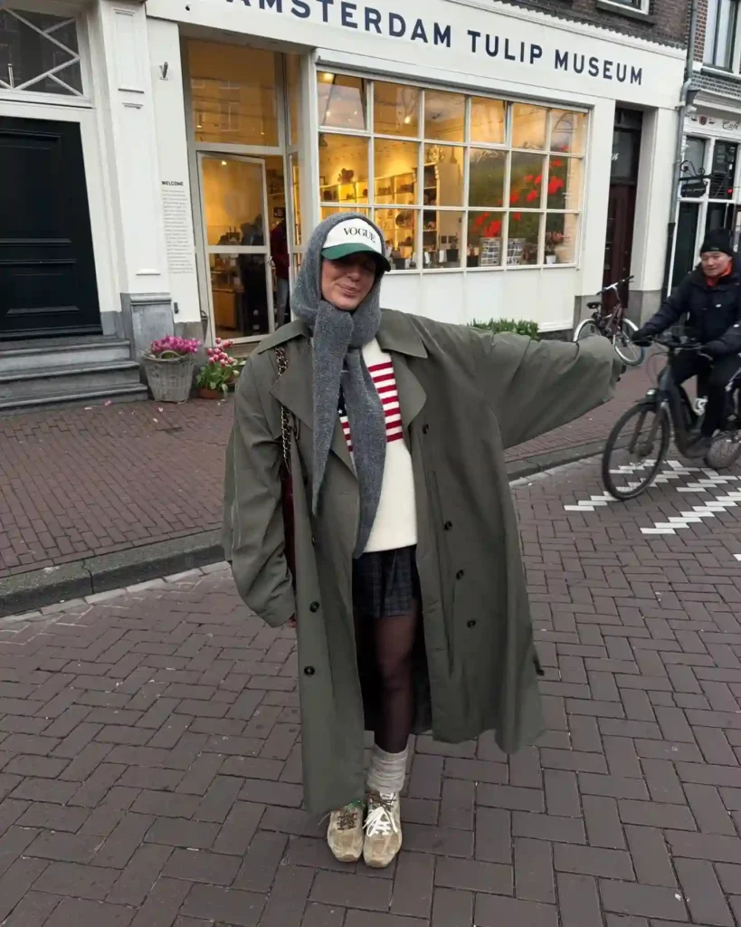 Oversized Trench and Plaid Skirt with Worn Sneakers