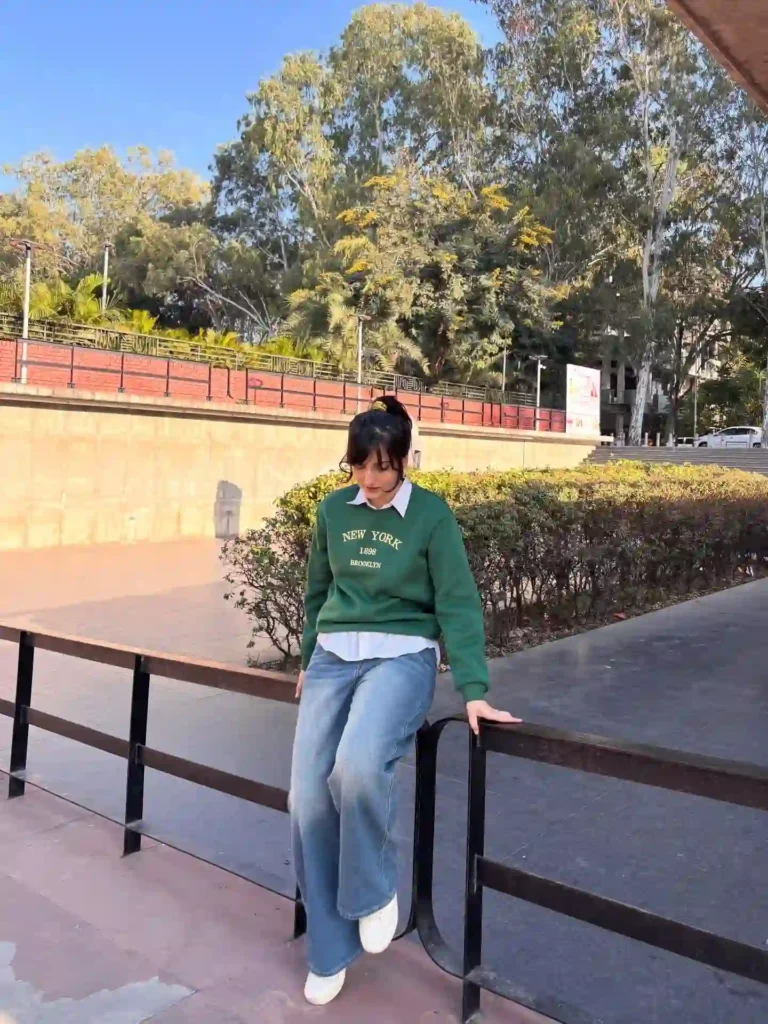 Green Sweatshirt and Wide-Leg Jeans with White Sneakers