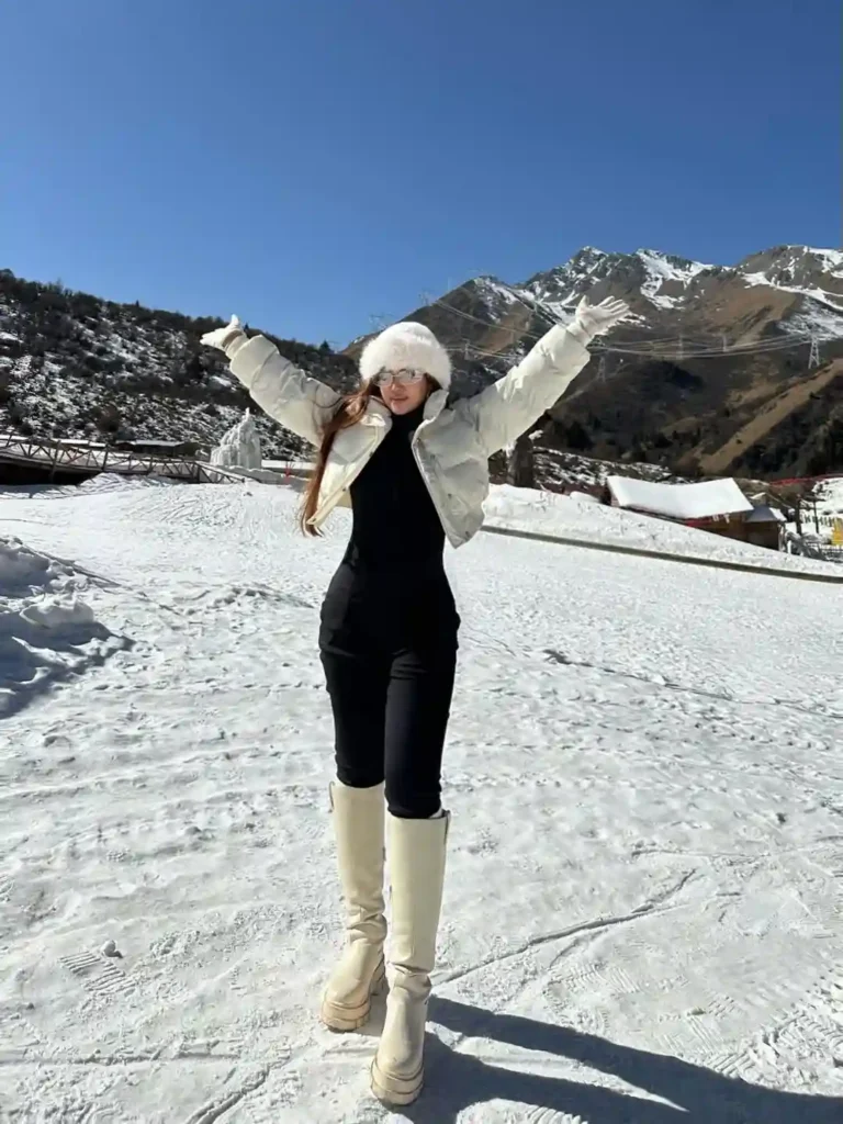 Cropped Puffer and Fur Hat with White Knee-High Boots