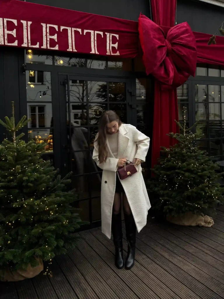 Cream Teddy Coat with Black Skirt and Knee-High Boots