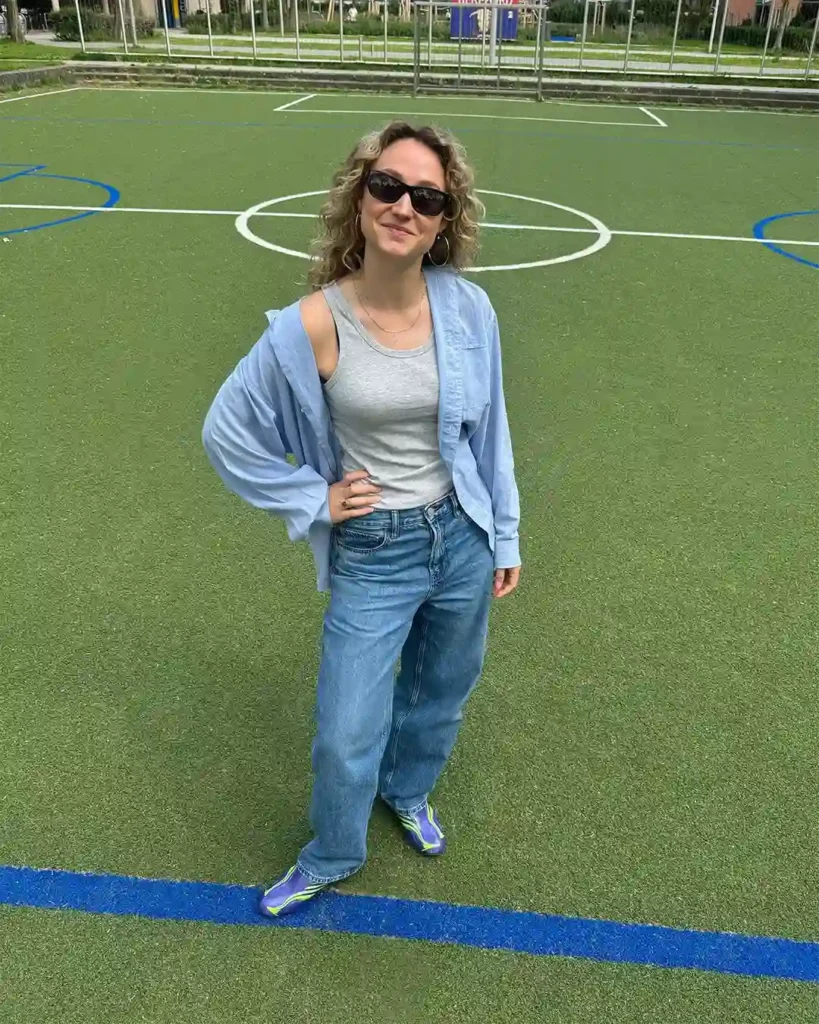 Blue Shirt Layered Over a Tank with Baggy Jeans