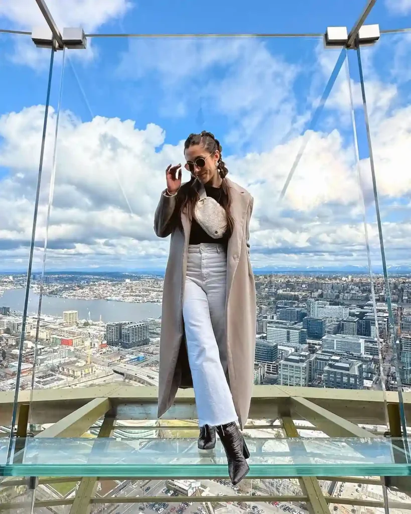 Long Beige Coat with Black Heeled Boots