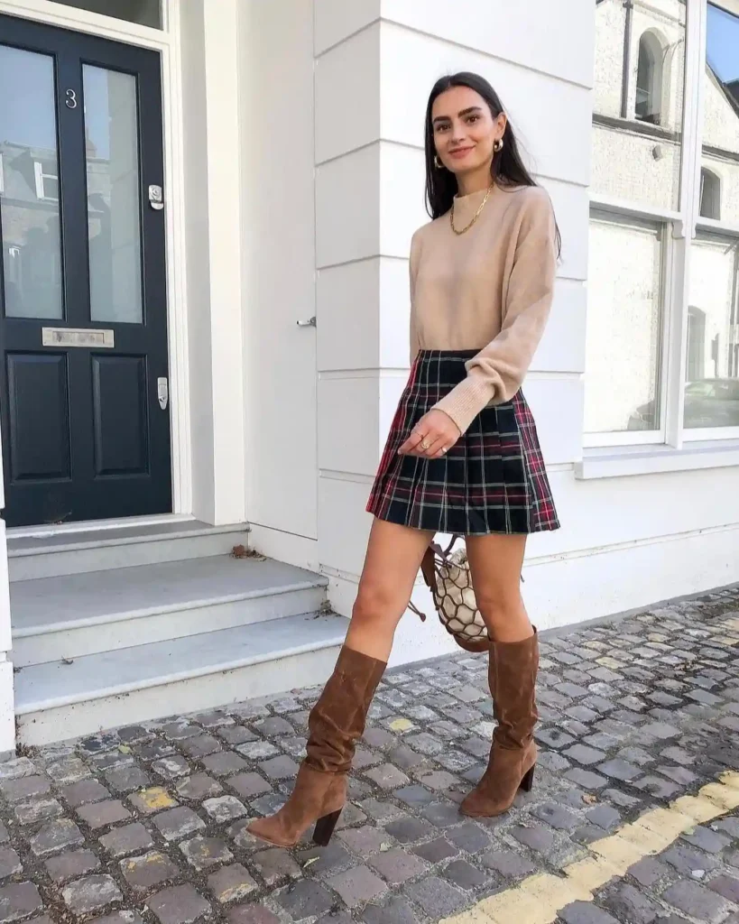 Beige Sweater with Tartan Pleated Skirt and Slouchy Suede Boots